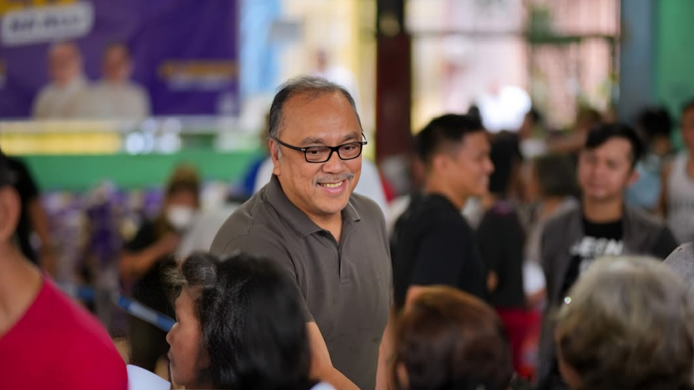 Congressman Reyes with elderly beneficiaries of the YES Senior and Junior Care program.